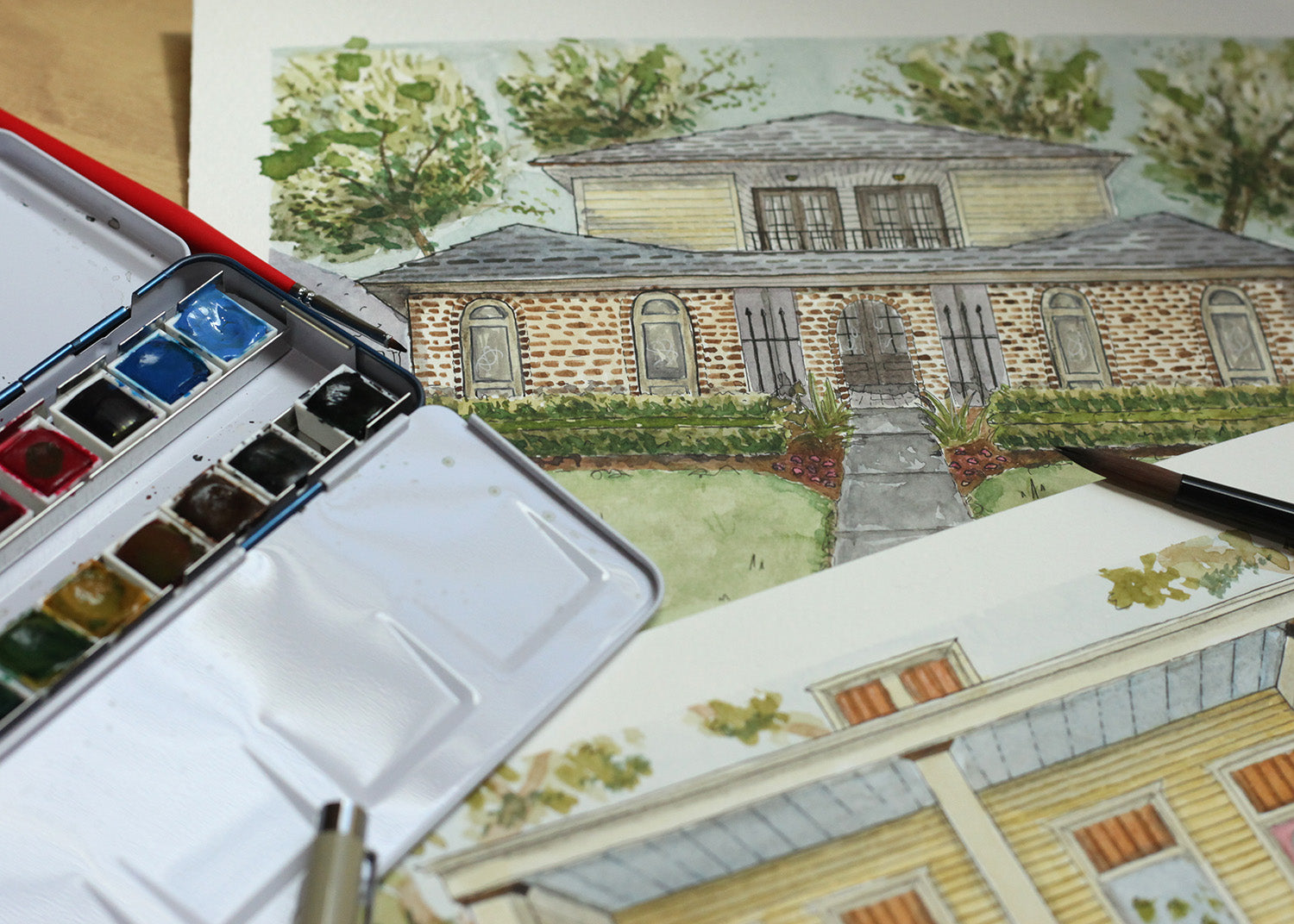 A watercolor house portrait painted by Yat Cat New Orleans